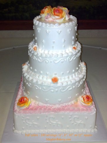 4 tier fall - Airbrushing in red, orange, yellow.6", 8", 10", 12" tiers. Serves 100.